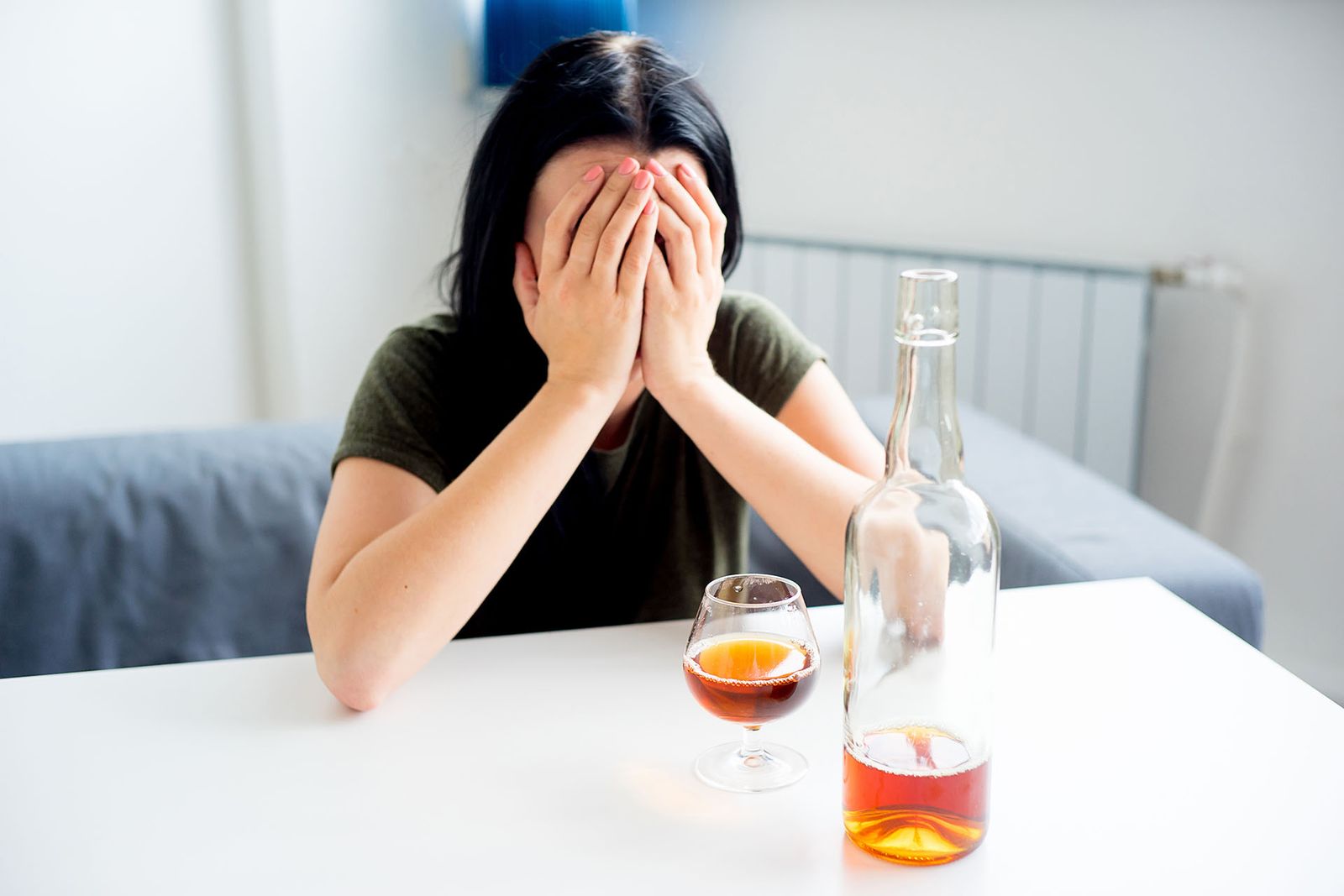 Woman binge drinking alcohol 