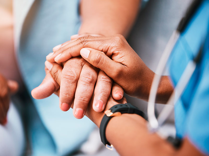 What-are-the-Key-Signs-of-Stress-Affecting-Mental-Health–1 The doctor holds the patient's hand